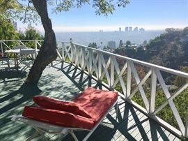 View of Beverly Hills, from the Deck of the Talented Bi-coastal Couple, Martin Davidson (Film and TV Director) and Sandy Davidson (Designer). They are giving up Hollywood's Glam for the Excitement of Manhattan. Come share memorable moments.
