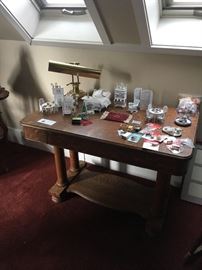 another view of the antique oak table with a drawer for storage