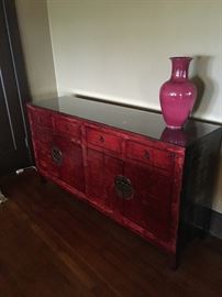 Antique lacquered console with glass top