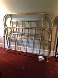 closer view of the vintage brass queen bed