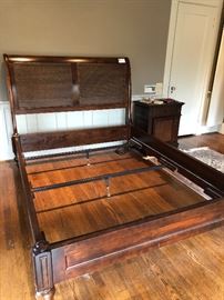 Caned and wood queen bed frame for sale. Mattress included but not shown