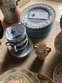 Wedgwood & Barlaston of Etruria Queensware set includes covered casserole, two oval platters, dinner plates, salad plates, bead and butter plates and cups and saucers. Both shell and non-shell edged pieces.