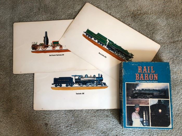 Vintage railroad place mats and book. Located upstairs bedroom on right.