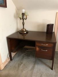 Vintage desk and antique brass and marble base lamp. Located upstairs, bedroom on right.