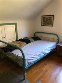 Fabulous turquoise painted iron bed, double size. Located upstairs, bedroom on left. 