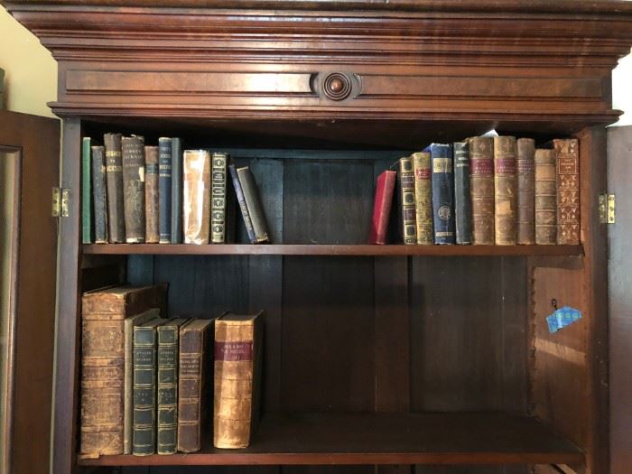 These antique books are located through out the main floor of house. 