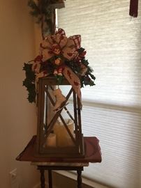 Lantern with handmade floral decorations.