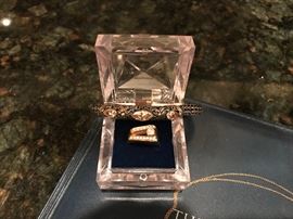 1/3 Carat Diamond with diamond insets in gold setting