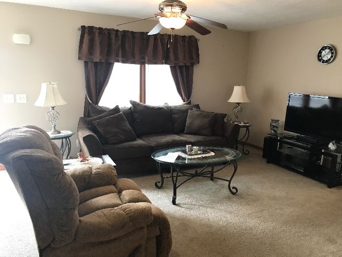 Microfiber brown sofa, Glass top end tables & coffee table, Tv & surround sound