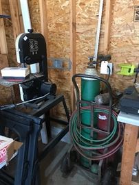 welding torch, ban saw, weed eater, saw legs