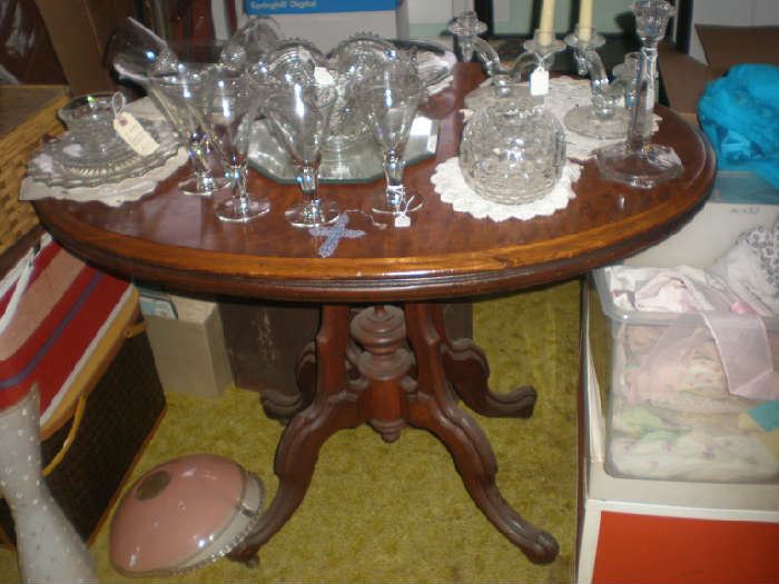 Beautiful oval library table was $199, now only $60 - sold. Lots of pretty glass, light fixture covers underneath.