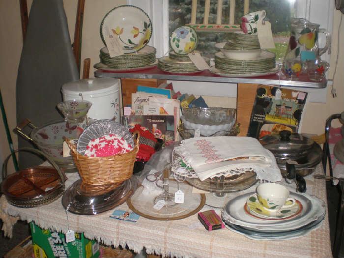 Blue ridge dishes, MCM chip and dip set, revere fry pans, relish trays, silverplate serving dish, large tin canister, ironing board and more!