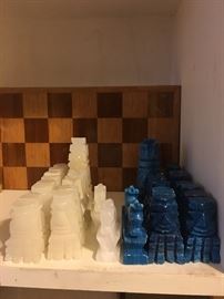 Marble blue and white chess set with hand carved Aztec style pieces