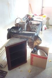 garage items & also showing antique walnut hanging cupboard.