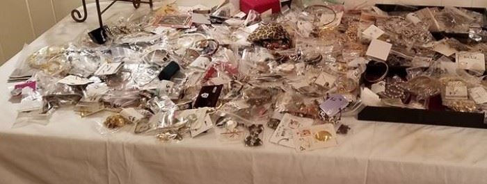 Over 800 pieces of jewelry this is not even a third of it in the picture 