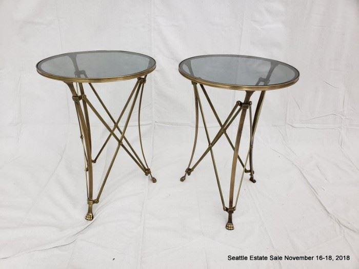 Bronze and glass side table with lion's paw feet.