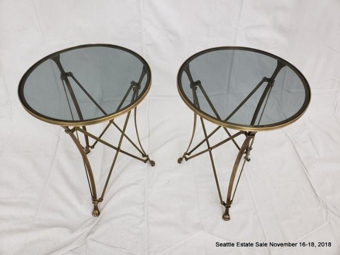 Bronze and glass side table with lion's paw feet.