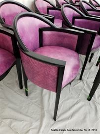 Set of 12 fuschia upholstered and ebonized frame dining chairs.
