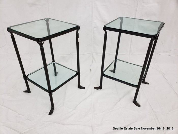 Patinated bronze and glass side table with hand and feet details.