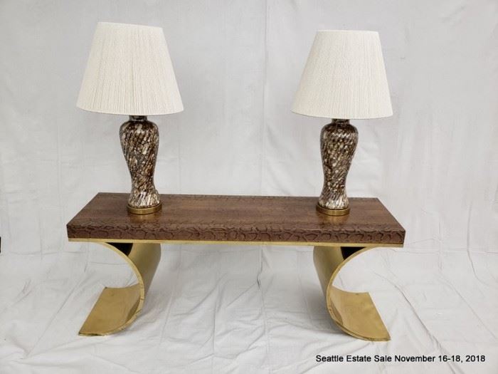 KARL SPRINGER Console table with python-covered top on polished brass base. 24" x 60" x 16"
