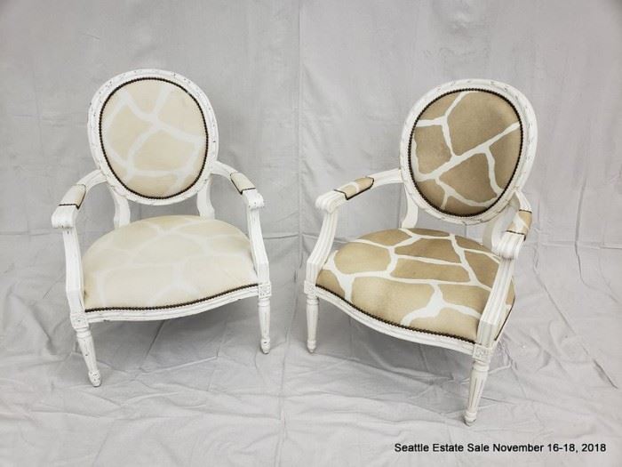 Open-arm chair with giraffe pattern upholstery