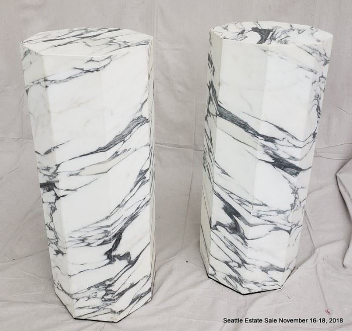 Octagonal black and white marble column.
