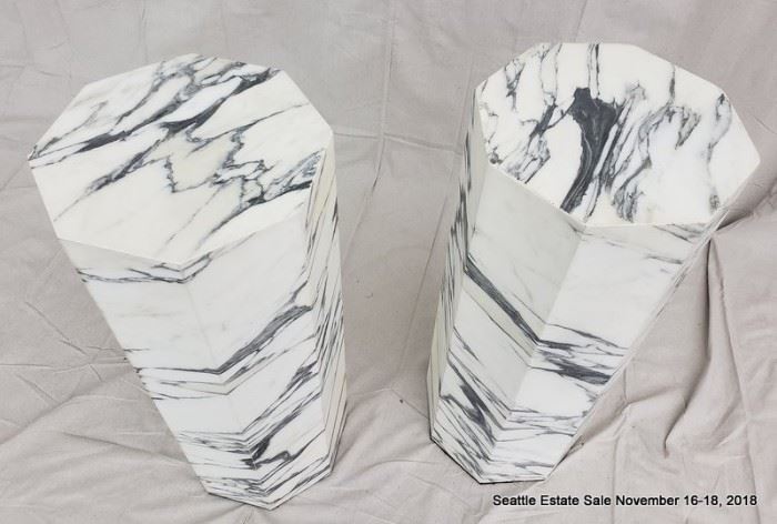 Octagonal black and white marble column.