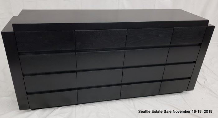 16-Drawer credenza with textured ebonized cerused wood finish.