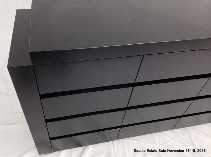 16-Drawer credenza with textured ebonized cerused wood finish.