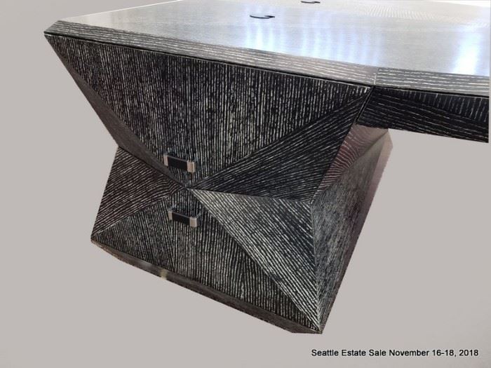 Angular black and white patterned cerused wood finish partners desk.