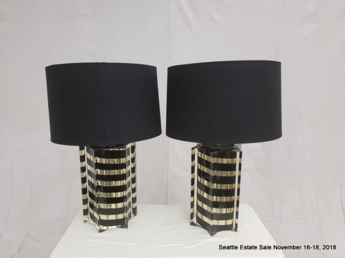 Vintage glack and gold table lamp with black shade.