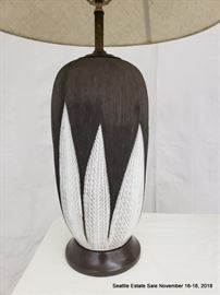 Two-tone ceramic lamp with white shade.