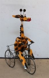 Giraffe on a trike