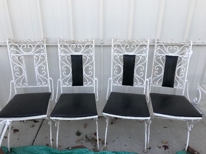 Set of four Woodard chairs