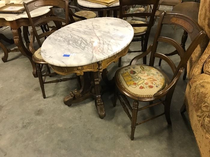Oval Marble top walnut table