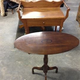 small oval table, with inlaid medallion, and walnut wash stand with draw