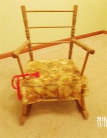 vintage childrens rocker with red bow