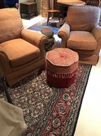 Pair of swivel chairs from Masins $540 the pair  rugs and footstool not for sale