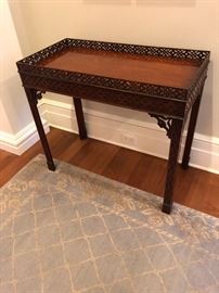 one of a pair of Chippendale style gallery edged consoles tables - 28:h x 18 3/4"d x 36 3/4"h originally $6500 for the pair asking $2800