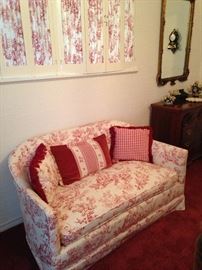 Red and white Toile loveseat; coordinating pillows