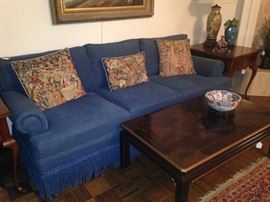 Blue 3-cushion sofa; Asian coffee table