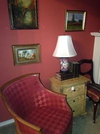 Curved back upholstered chair; one of two 3-drawer side chest