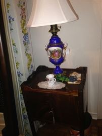 Cobalt blue urn lamp; small antique side table
