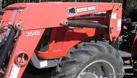 Front end loader is a Bushhog 3545