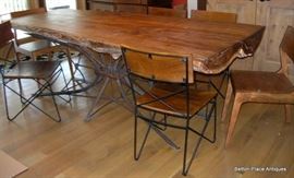 Absolutely Fabulous Cypress Slab Table made in Apalachicola , metal base, 6 chairs and is just magnificent, will get measurements added soon.  This Slab is from a log found in the Apalachicola River, many years ago.