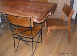 Absolutely Fabulous Slab Table made in Apalachicola , metal base, 6 chairs and is just magnificent, will get measurements added soon.  This Slab is from a log found in the Apalachicola River, many years ago.