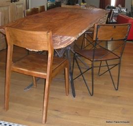 Absolutely Fabulous Slab Table made in Apalachicola , metal base, 6 chairs and is just magnificent, will get measurements added soon.  This Slab is from a log found in the Apalachicola River, many years ago.