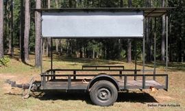 Outdoor Peanut Wagon , covered single axle 5 ft wide, 10 ft long bed, 6 1/2 ft high ,  2 fold outs of 27 inches by 8 ft long.