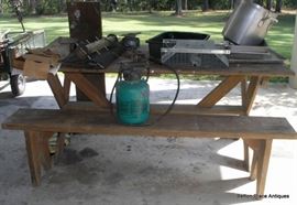 Several Wooden Picnic tables and Benches