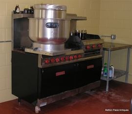 Another picture of the Vulcan commercial gas stove, with vent, chimney and hood